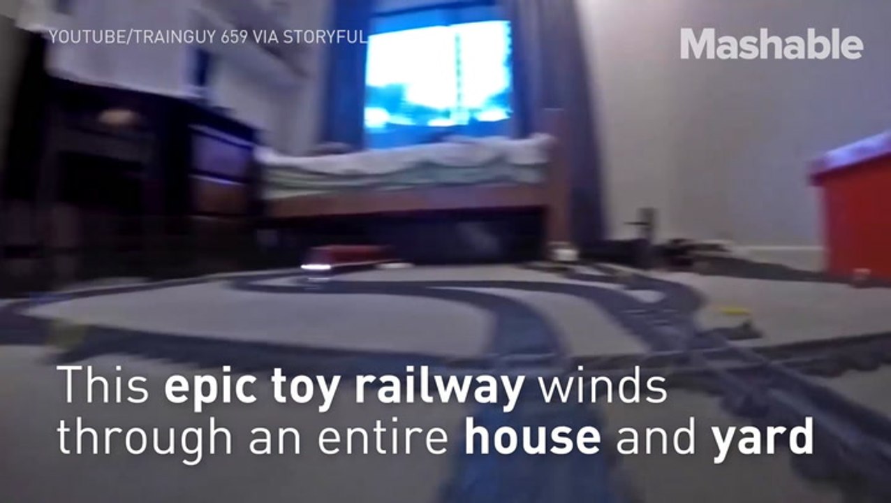 Ride this tiny train through the gigantic Lego railroad of your dreams