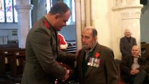 Moving moment D-Day veteran is presented with medals he was too humble to collect