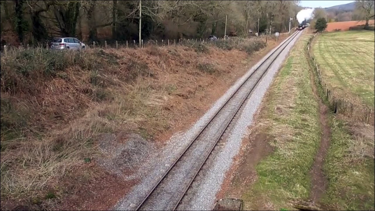 English Steam Locomotive Travelling through Countryside