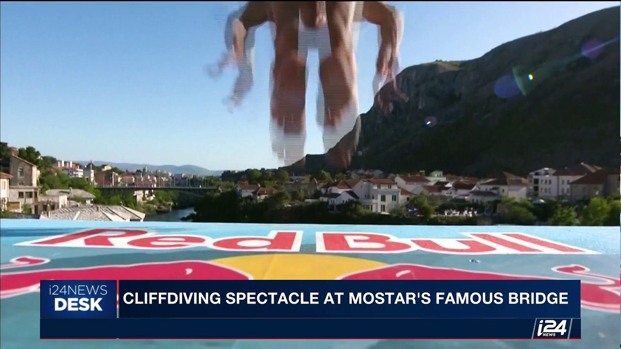 i24NEWS DESK | Cliffdiving spectacle at mostar's famous bridge | Sunday, September 17th 2017