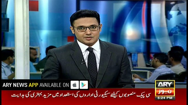 Horse-riders play tent pegging