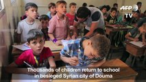Back to school in besieged Syrian city of Douma