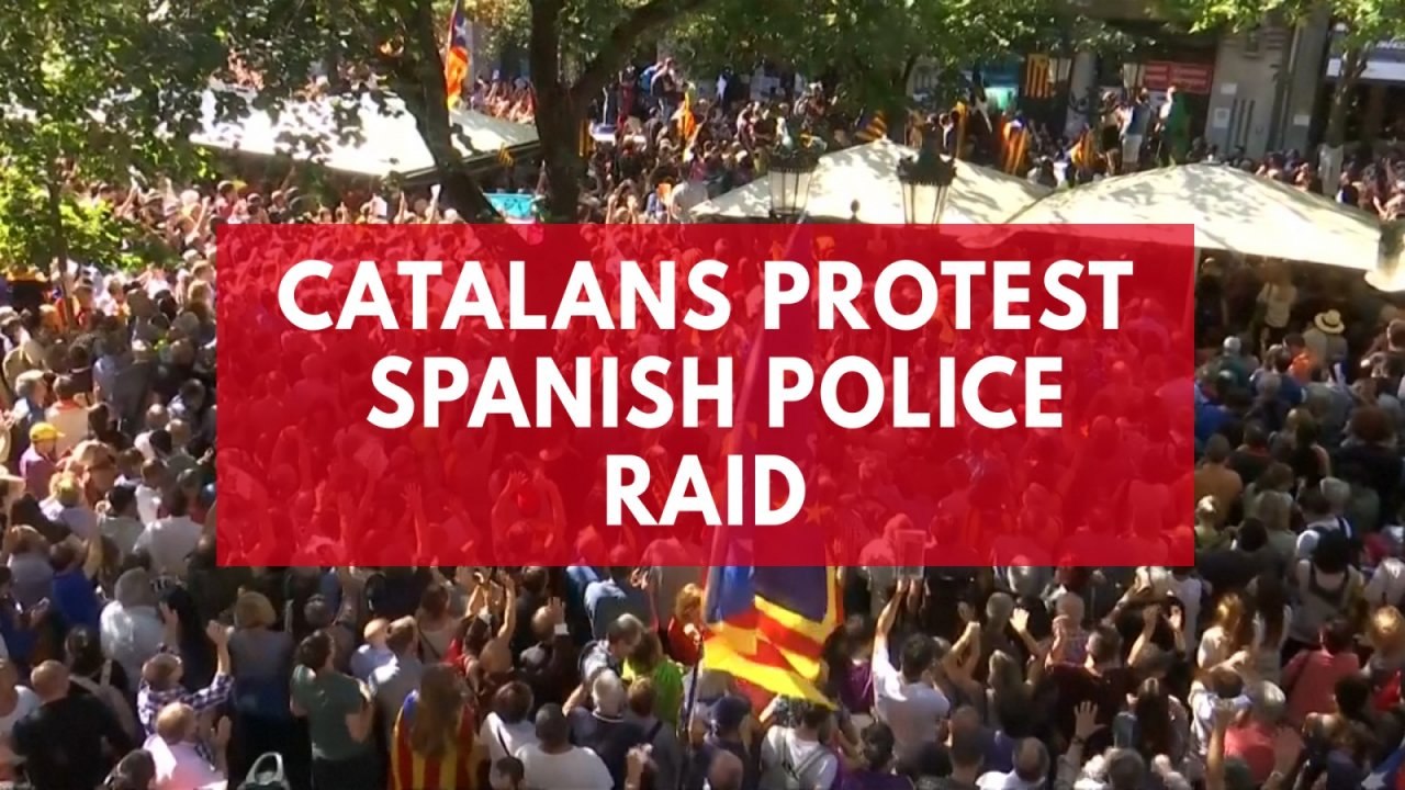 Thousands protest after Spanish police raid Catalan ministry ahead of banned independence vote