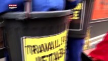 Emmanuel Macron : des militants dans des poubelles protestent devant le siège de LREM (Vidéo)
