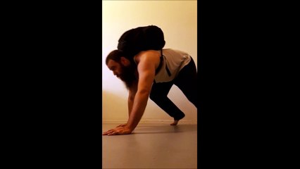 Weighted bear crawls with a 15 kilogram backpack