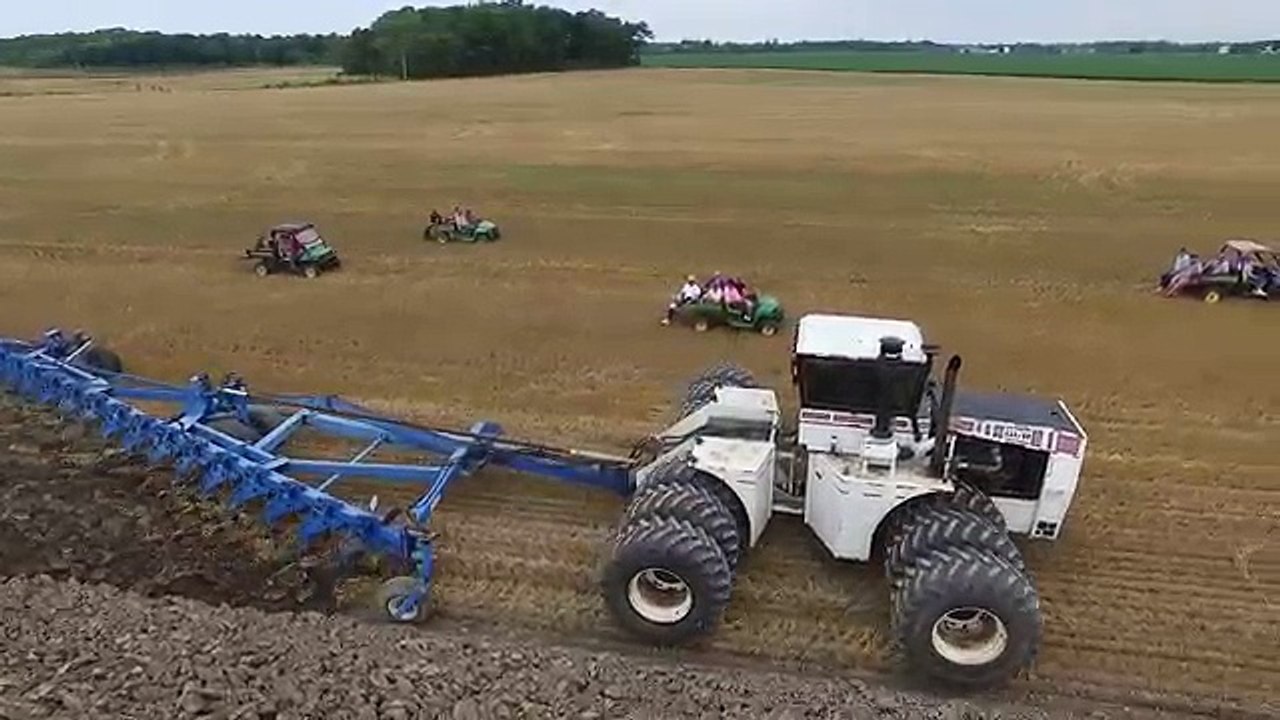 Big Bud with 21 bottom plow