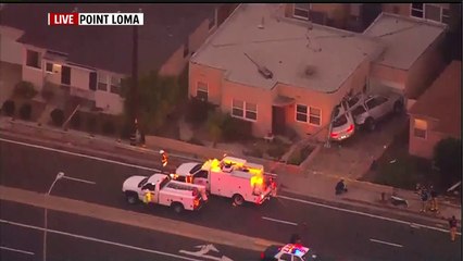 Trapped Driver Rescued After Slamming Car into San Diego Home