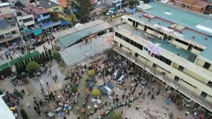 Los equipos de rescate están "muy cerca" de salvar a una niña mexicana de una escuela derrumbada