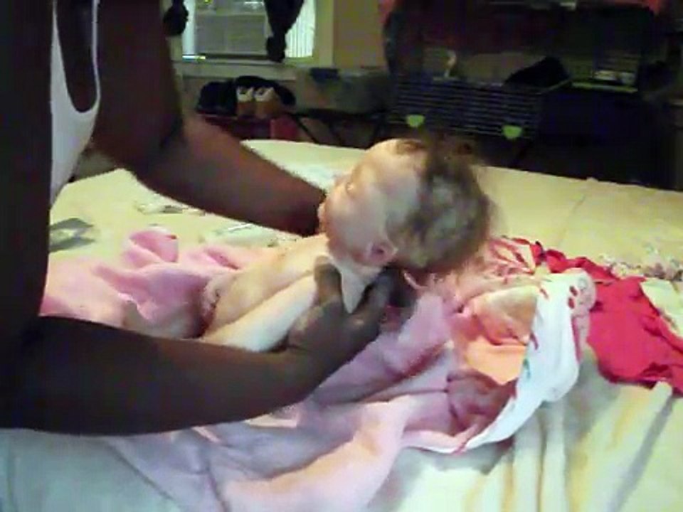 Dressing my silicone baby Nadia after her bath...