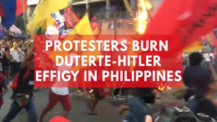 Download Video: Protesters burn Duterte-Hitler effigy in Philippines