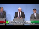 Kiev govt, Russia, Germany, France agree E. Ukraine ceasefire