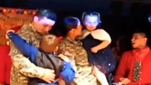Husband-And-Wife Army Soldiers Surprise Their Young Kids At Holiday Party