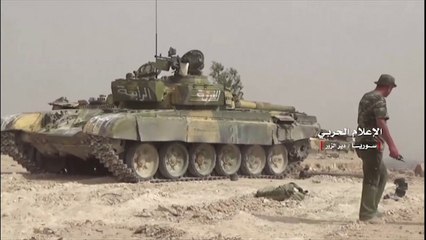 Syrian government forces battle IS in Deir ez-Zour