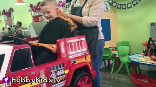 HobbyKids Get Haircuts in Toy FireTruck! Dinosaur + Candy Surprise HobbyKidsTV
