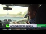 RT travels with Russian aid convoy through war-torn E. Ukraine