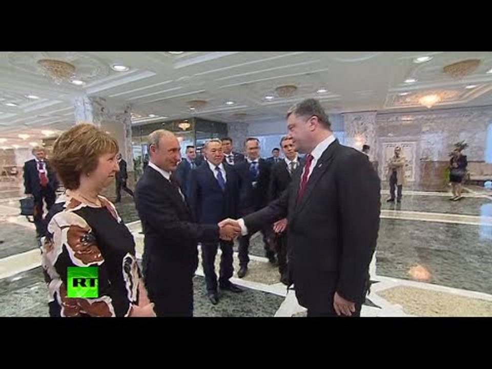 In search of peace: Putin & Poroshenko shake hands at key Ukraine talks