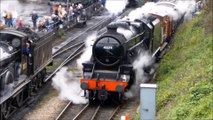 Steam Train leaving Railway Station with Goods Train