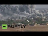 Explosions, huge plumes of black smoke fill Kobani skyline
