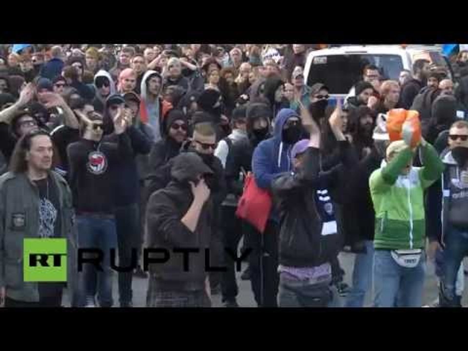 ‘Hooligans against Salafists’: Water cannons, violence at huge far-right rally in Germany