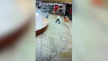 Woman Avoids Collapsing Glass Ceiling Twice During Earthquake