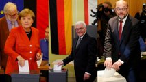 Merkel y Schulz votan
