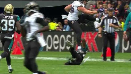 Nick Boyle hurdles over Jaguars defenders for 7-yard gain