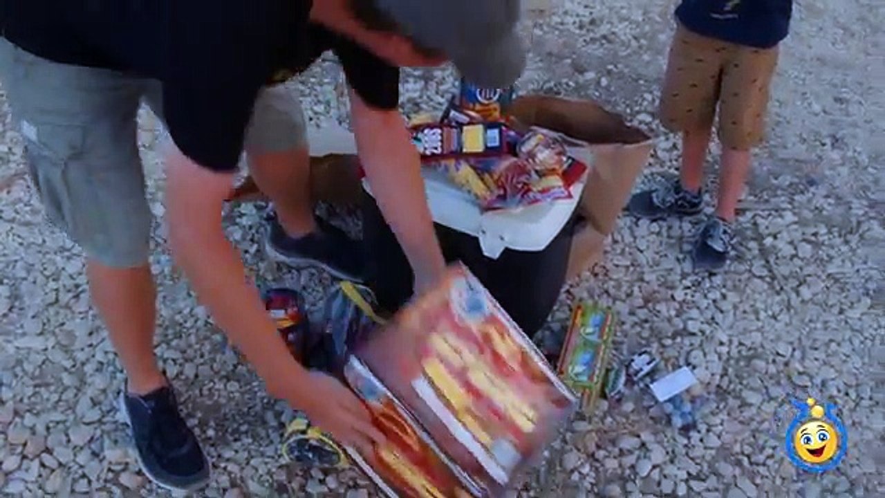 Family Fun Night Playing with Fireworks on 4th of July Lighting Parachute Fireworks & TNT Poppers