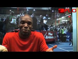 LaShawn Merrit Signing his Shoes for the Perdiction Contest Winner