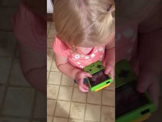 Toddler Discovers Game Boy Lacks Touch Screen