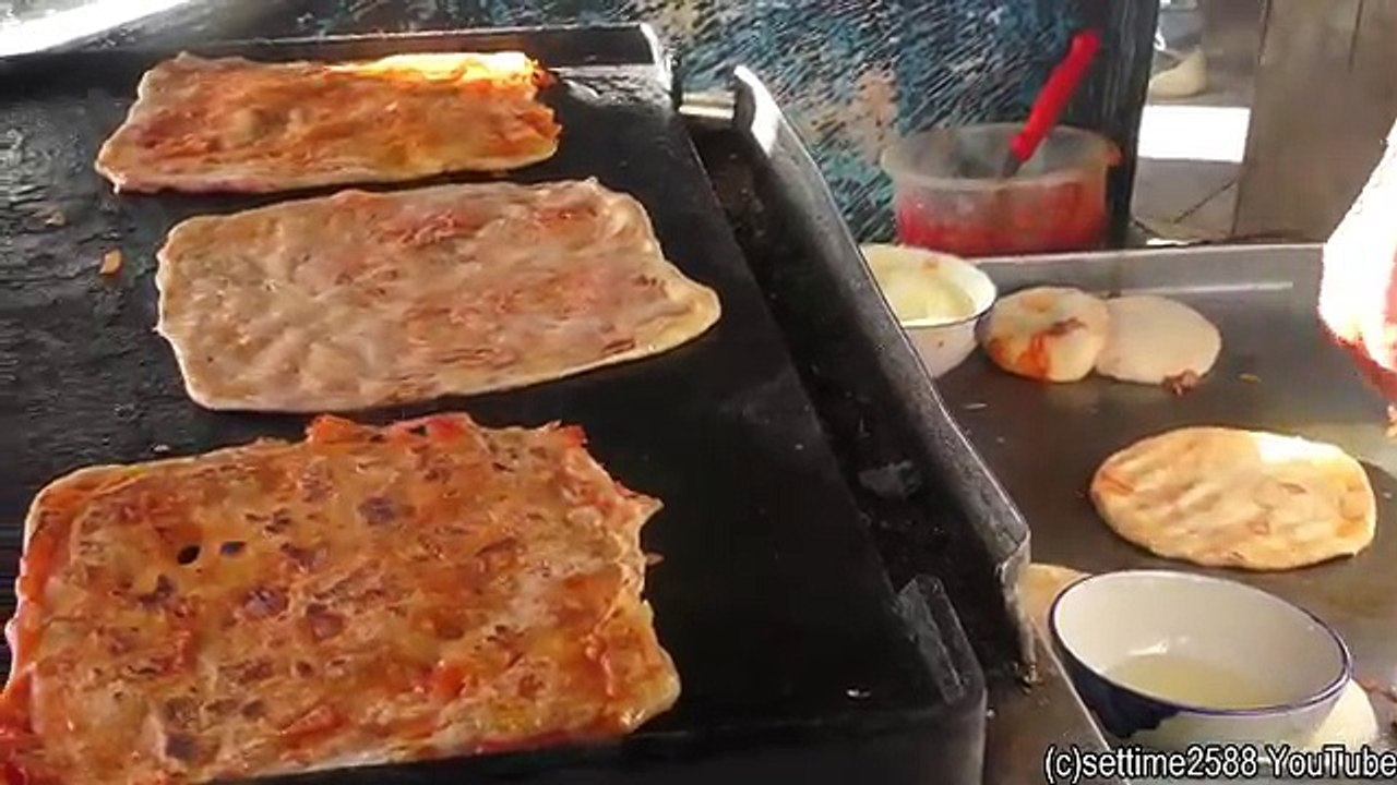 Street Food of Marrakech, Morocco. Cooking the Msemmen Pancake. Moroccan Crepe