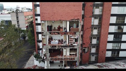 Drone footage shows Mexico tower block with entire front wall missing