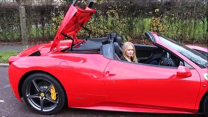 Girl driving her brand new Ferrari 458 Spider