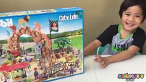 A Giant Panda inside our Playmobil Zoo Animals toys for kids City Life lion, penguin, rhino, giraffe