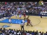 Tracy McGrady fakes the defender and hits Luis Scola with a