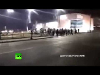 Moment Ferguson cops shot at caught on cam