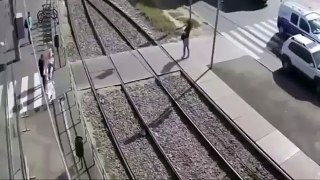 Woah! Woman Talking On Her Cell Phone Gets Hit By A Train