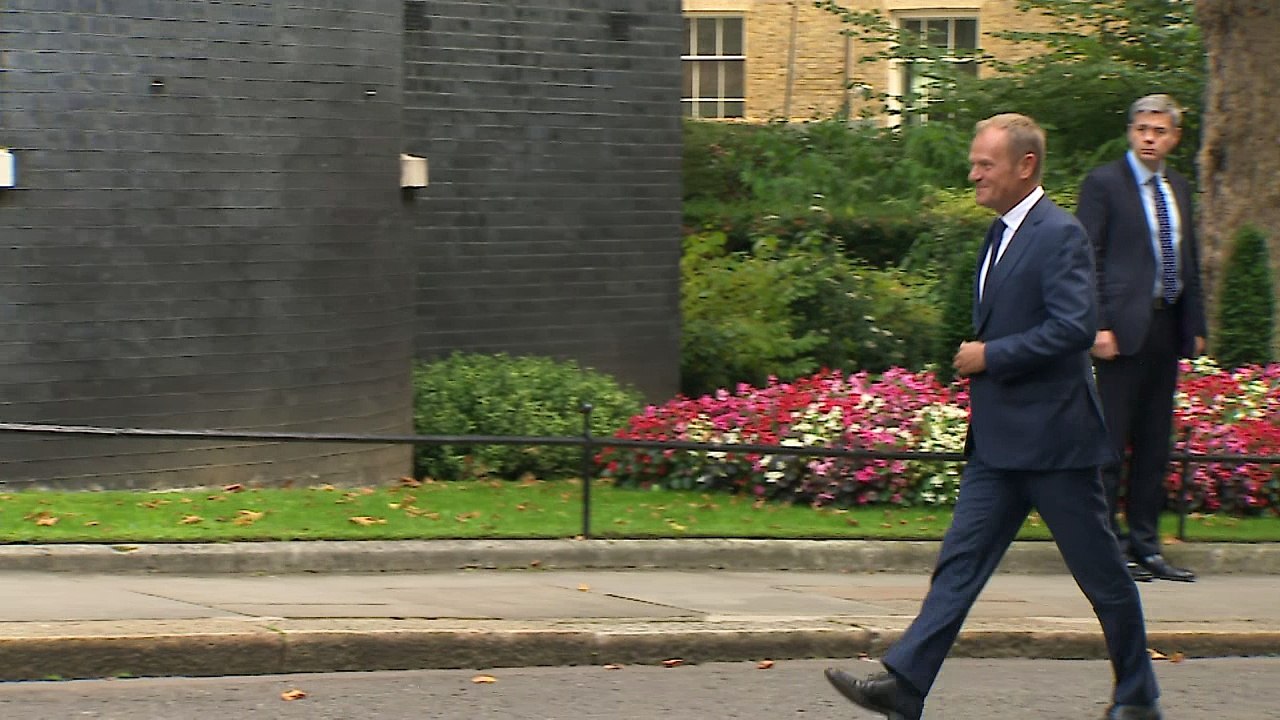 Donald Tusk arrives at Downing Street