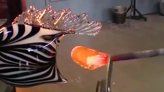I could seriously watch these glassblowers all day