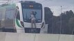 Guy Hangs Of High Speed Train In Australia