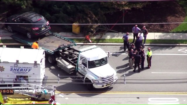 Woman Killed After SUV Jumps Curb at New Jersey Bus Stop