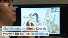 Koreli mülteci kadın karikatür úst.