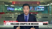 Volcano spews rock, dumps ash near Mexico City