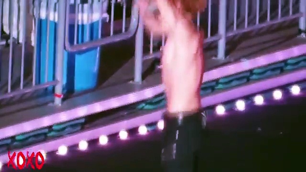 EXO members showing their ABS