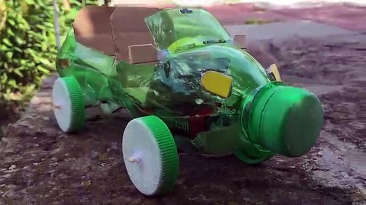 How to Make a Car Out of Plastic Bottle - (Powered Car/Electric Toy)