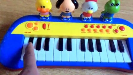 Kids Fun Learning Different Sounds Playing With Toy Xylophone, Piano And Guitar
