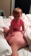 A baby trying to raise a dad (after 15 seconds ...!