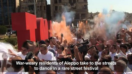 Aleppo Syrians unveil new art installation with street festival