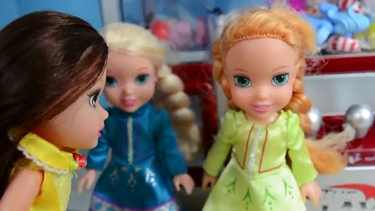 Elsa And Anna Toddlers Play Claw Machine For Toys! Belle Gets Stuck Inside!