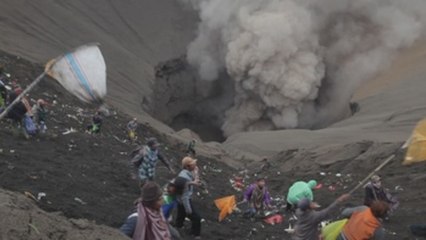 Life goes on inside Bali's Mt Agung volcano danger zone