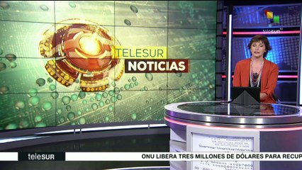 Familias catalanas se instalan en los colegios electorales